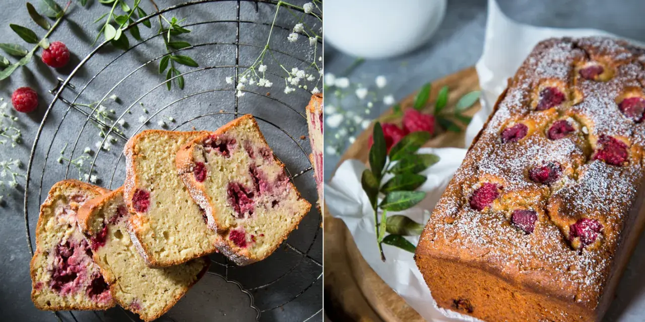Saftiger Himbeer-Zitronen-Kuchen, bestäubt mit Puderzucker. Auf einem Gitter und auf einem Holzbrett mit frischen Himbeeren und Grün dekoriert.