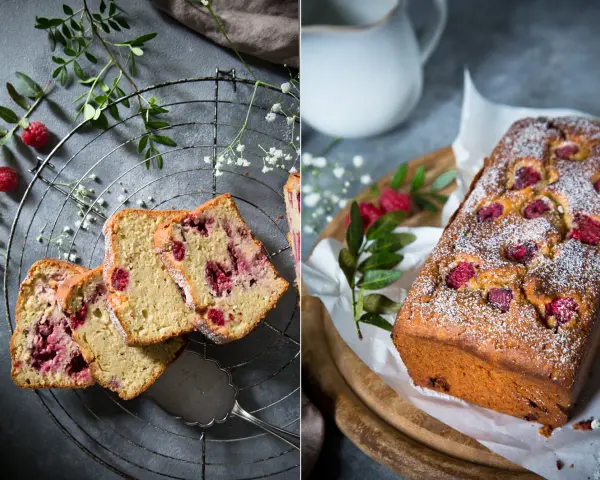 Saftiger Himbeer-Zitronen-Kuchen, bestäubt mit Puderzucker. Auf einem Gitter und auf einem Holzbrett mit frischen Himbeeren und Grün dekoriert.